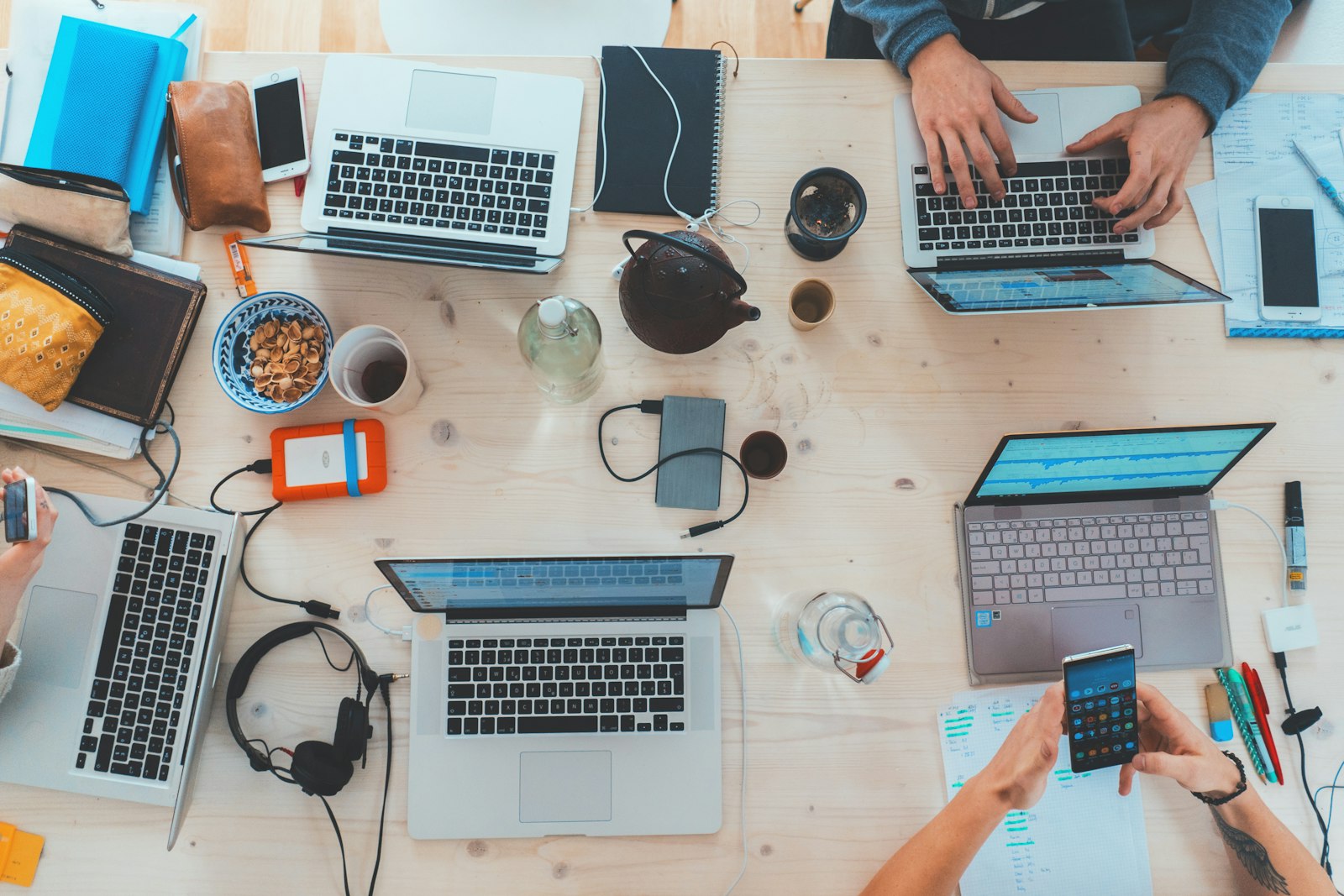 Laptop and notebook on a desk representing affiliate marketing and online work from home setup