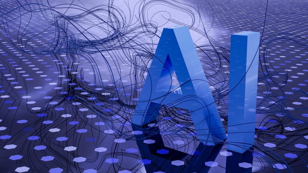 AI prompt engineering on a laptop screen showing ChatGPT interface with a person typing prompts