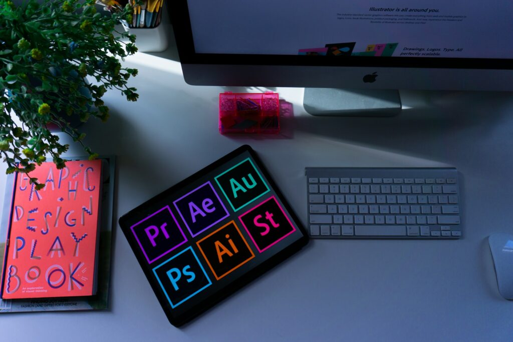 Freelance graphic designer working on logo design and brand assets from a home office setup