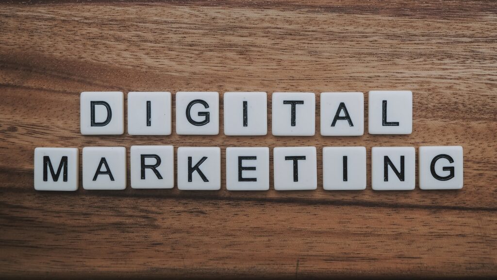 Digital marketing analytics and charts visible on a laptop screen while working