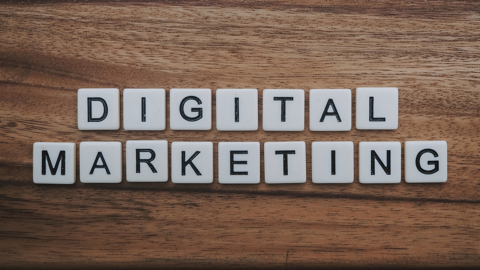 Digital marketing analytics and charts visible on a laptop screen while working