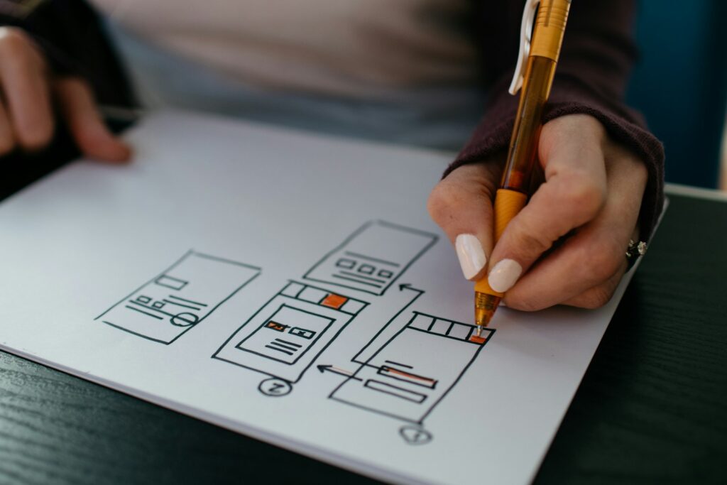 Freelance web design side hustle — building websites on a laptop from home
