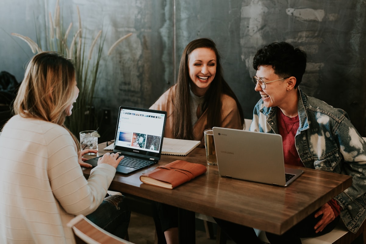 Team of professionals working together in a modern office workspace